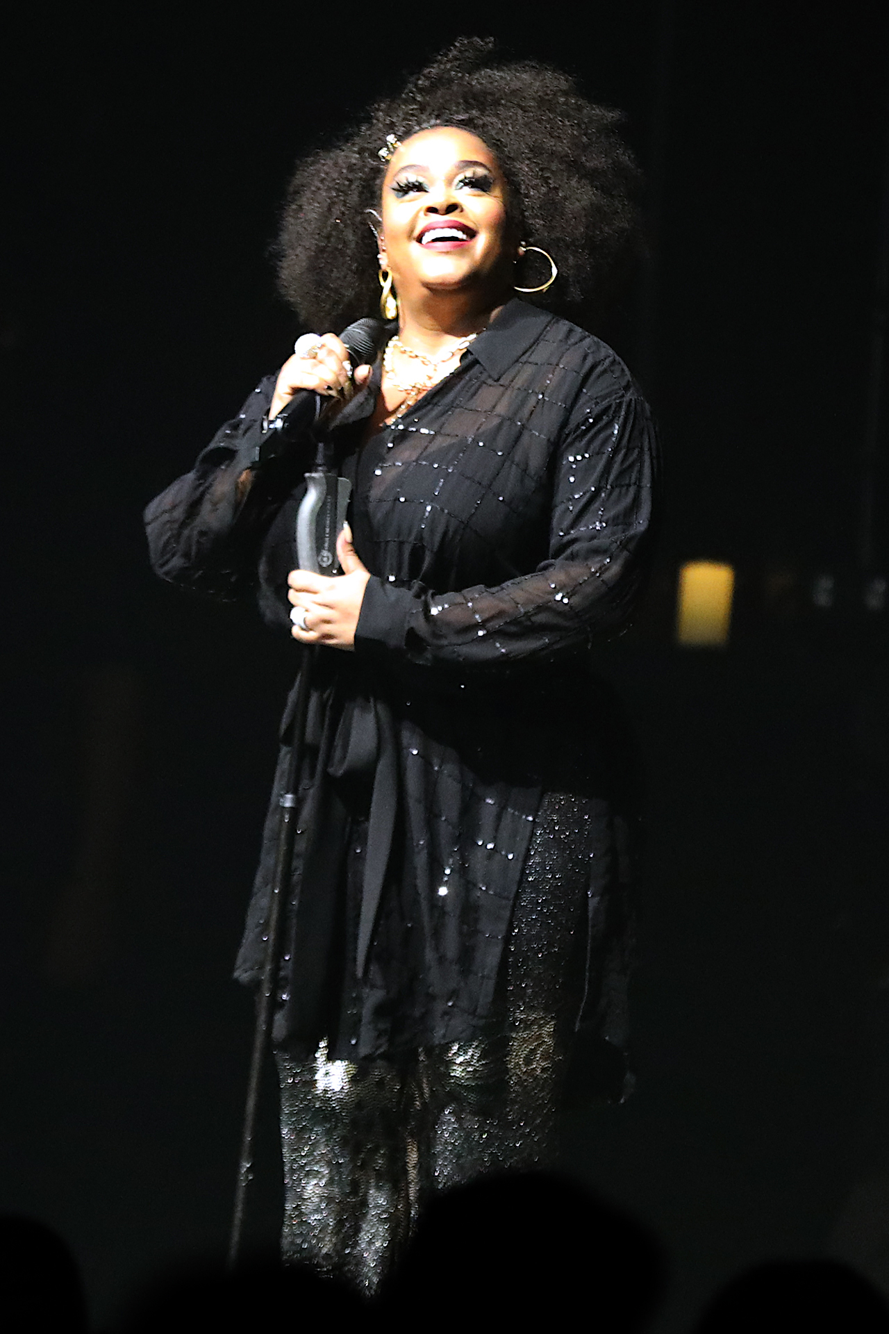 Jill Scott Standing at the Mic