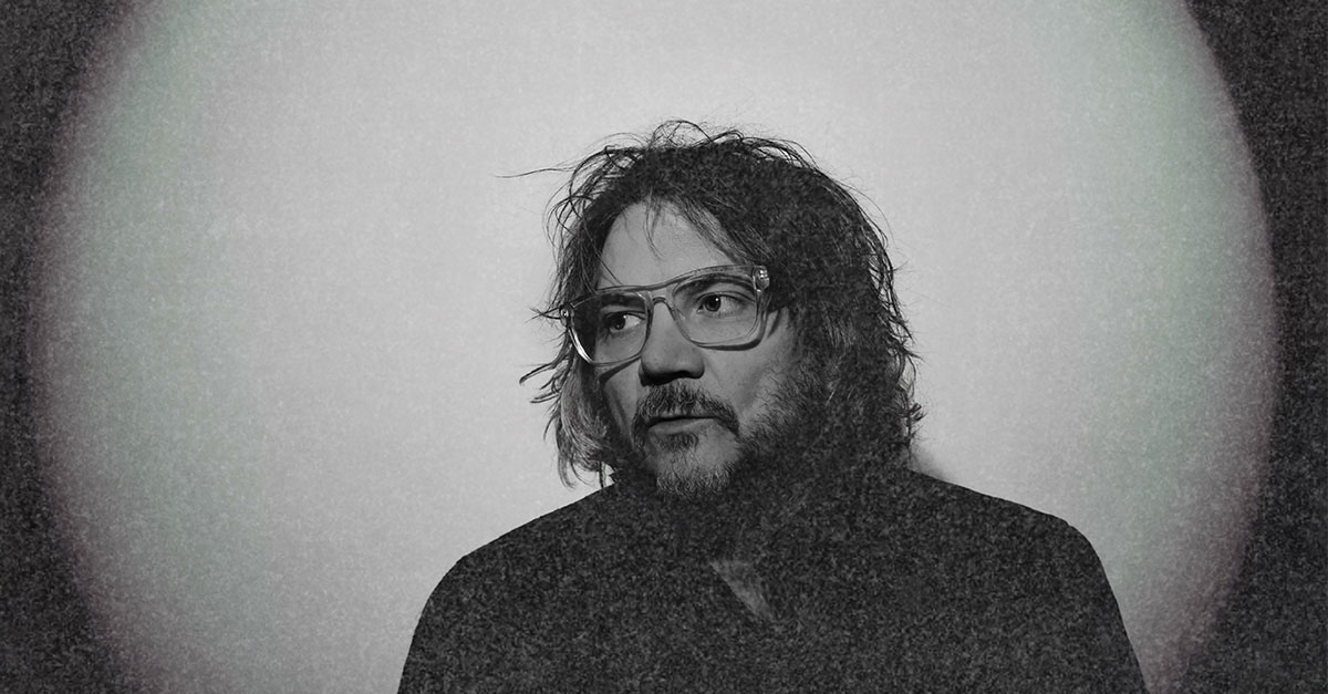 A man posing for a photo