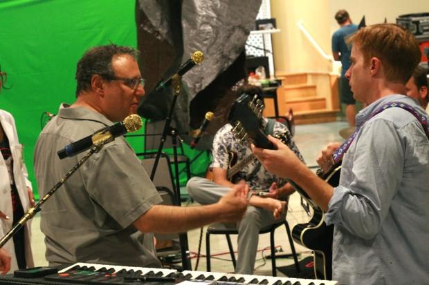 Dan Rothenberg, left, of Pig Iron Theatre Company directs Dr. Dog's Scott McMicken during rehearsal for SWAMP (IS ON) | Photo by John Vettese