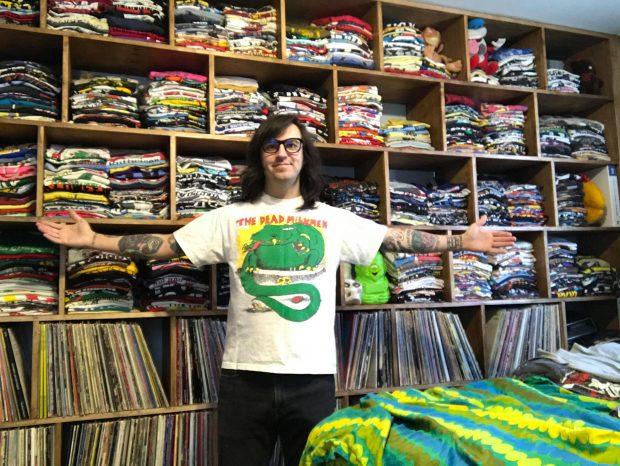 Perry Shall and his t-shirt collection | photo courtesy of the artist