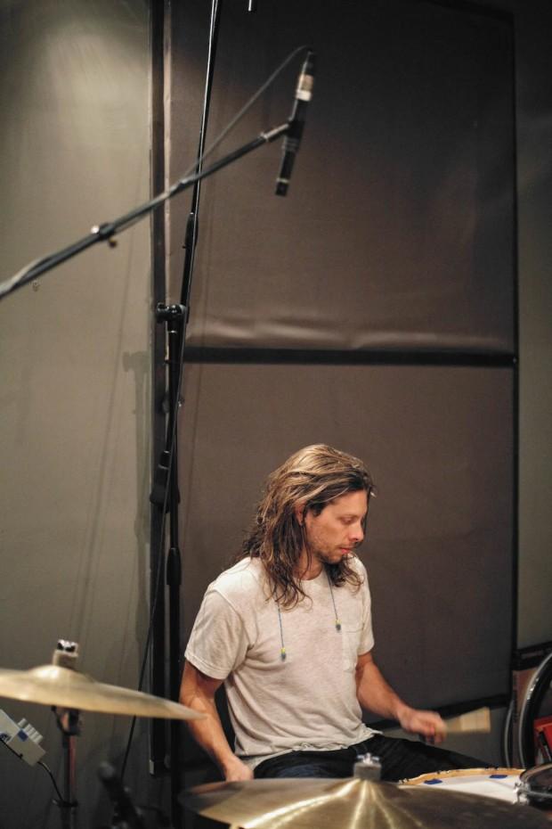 Mark Quinlan playing drums at Headroom Studio while recording Painted Shut
