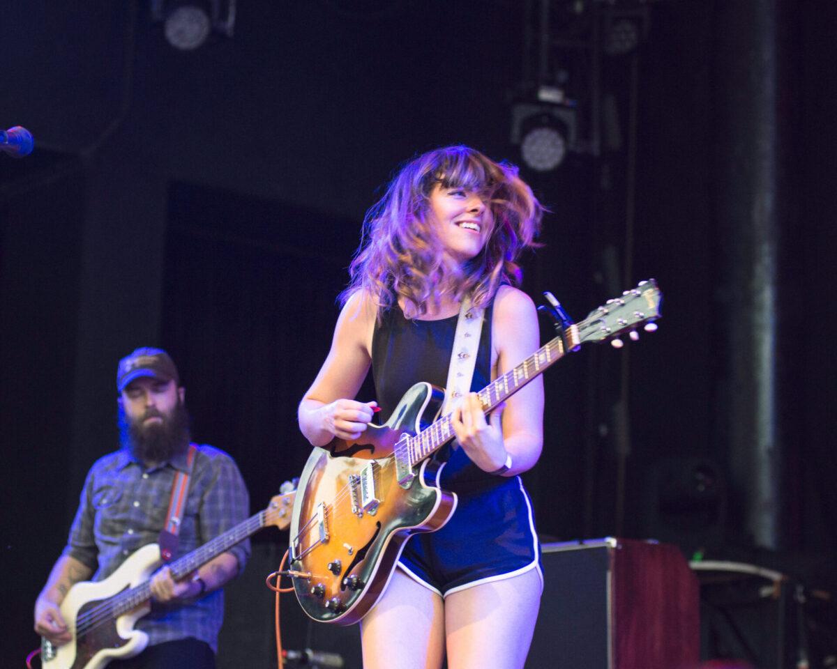 Frances Quinlan performing with a smile