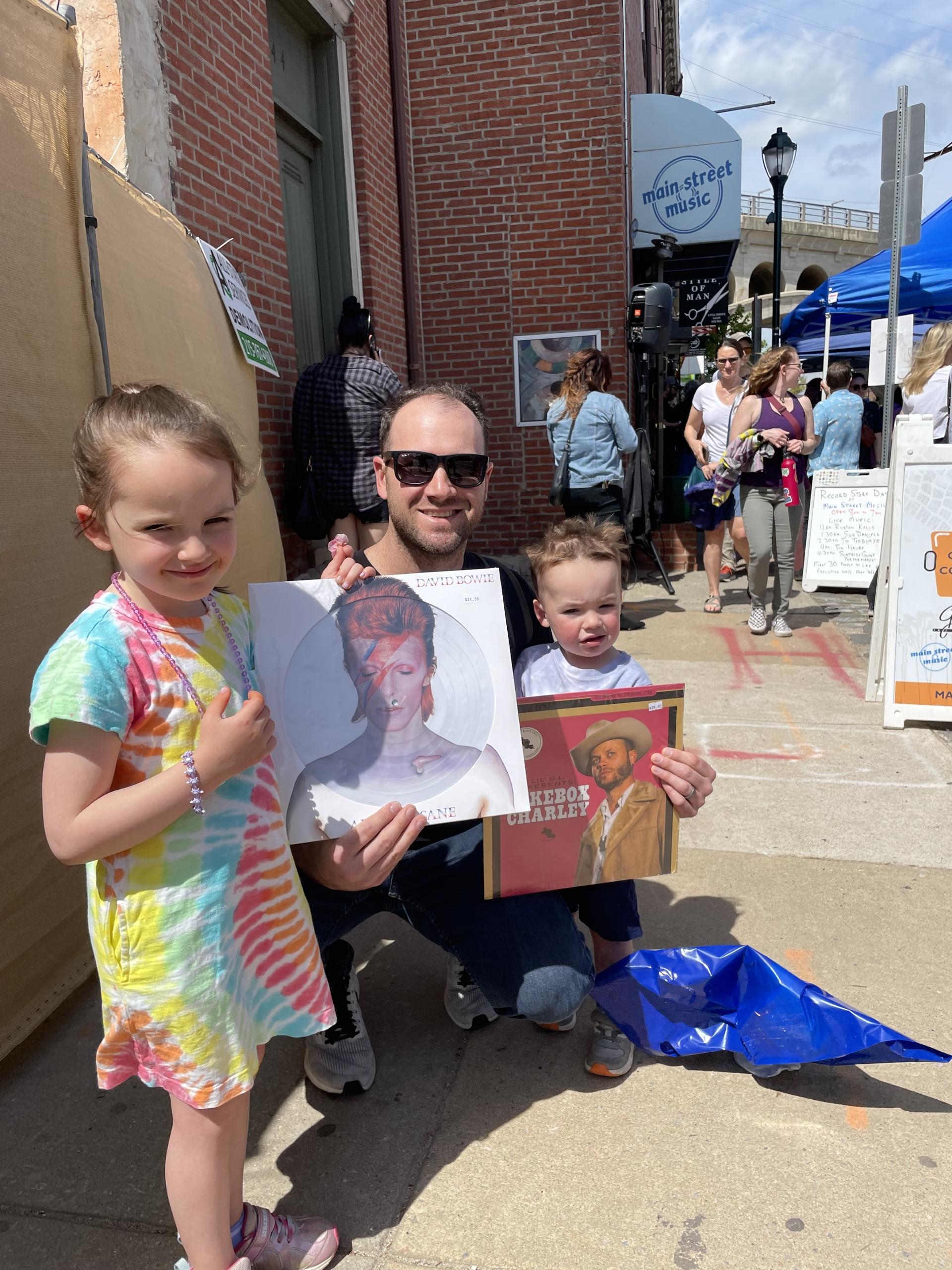 Mike Vasilikos and his kids at Main Street Music