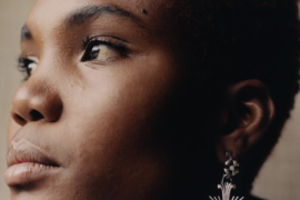 Arlo Parks clings to poetic intimacy on debut LP <em>Collapsed In Sunbeams</em>