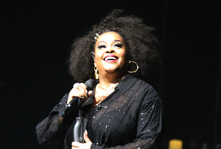 Jill Scott Standing at the Mic